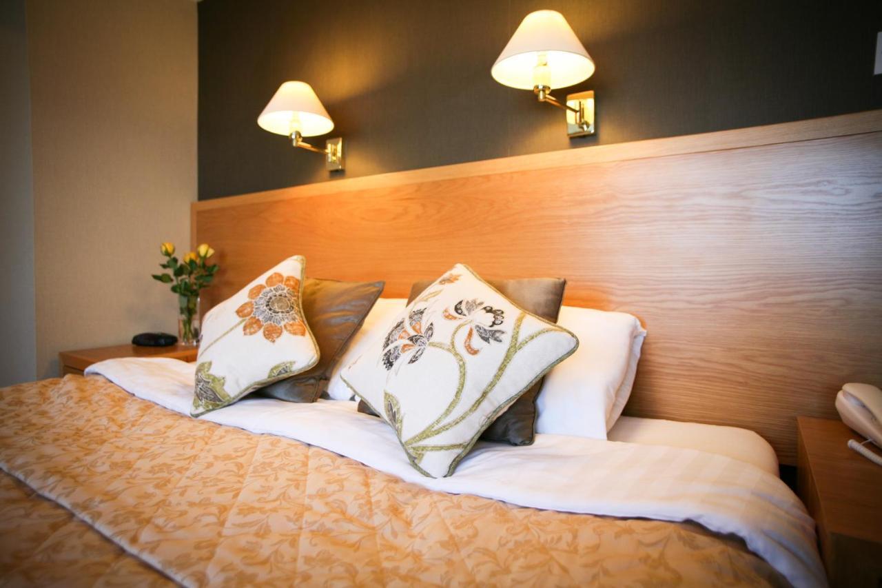 The Tomich Hotel Экстерьер фото